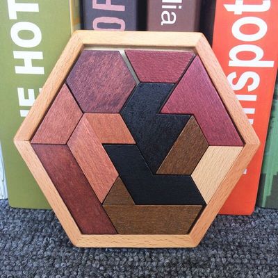 子供のMontessoriの六角形の木のジグソー パズル