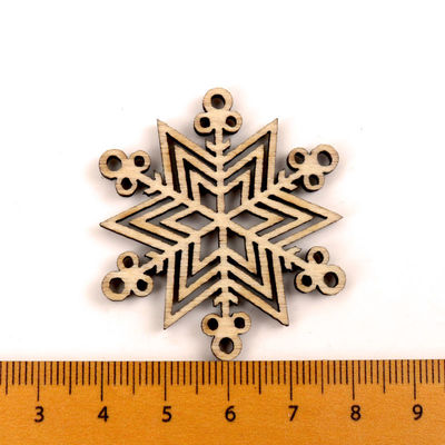 スクラップブックの絵画雪片はハンドメイドの木の技術を模造する