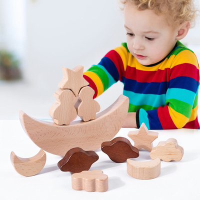 Montessoriの子供の教育おもちゃの木のブロックの星によっては積み重ねられたブロックの木のおもちゃのDiyの赤ん坊のバランスの訓練の反対論がうろつく